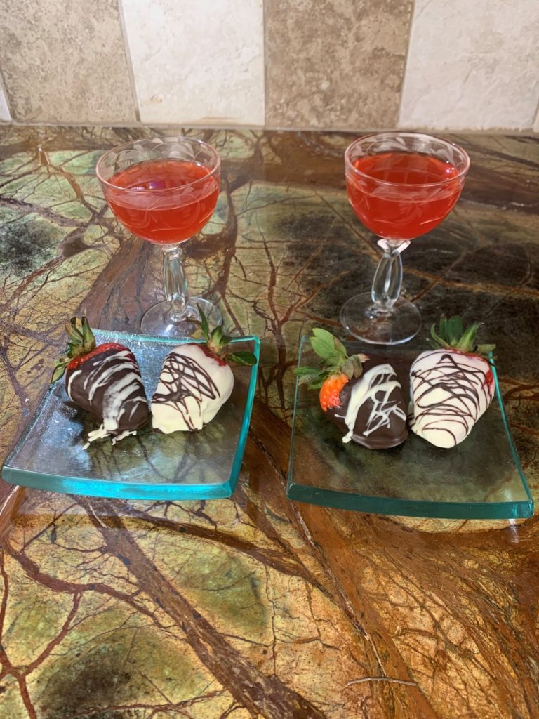 Strawberry Citrus Soup served with Chocolate Dipped Berries